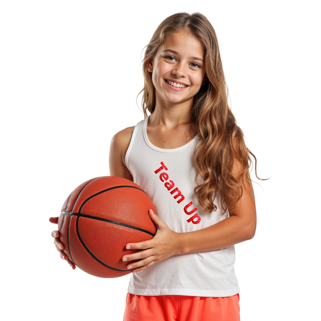 Young player holding a basketball in her Team Up jersey